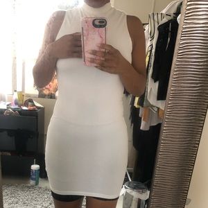white sleeveless turtleneck dress